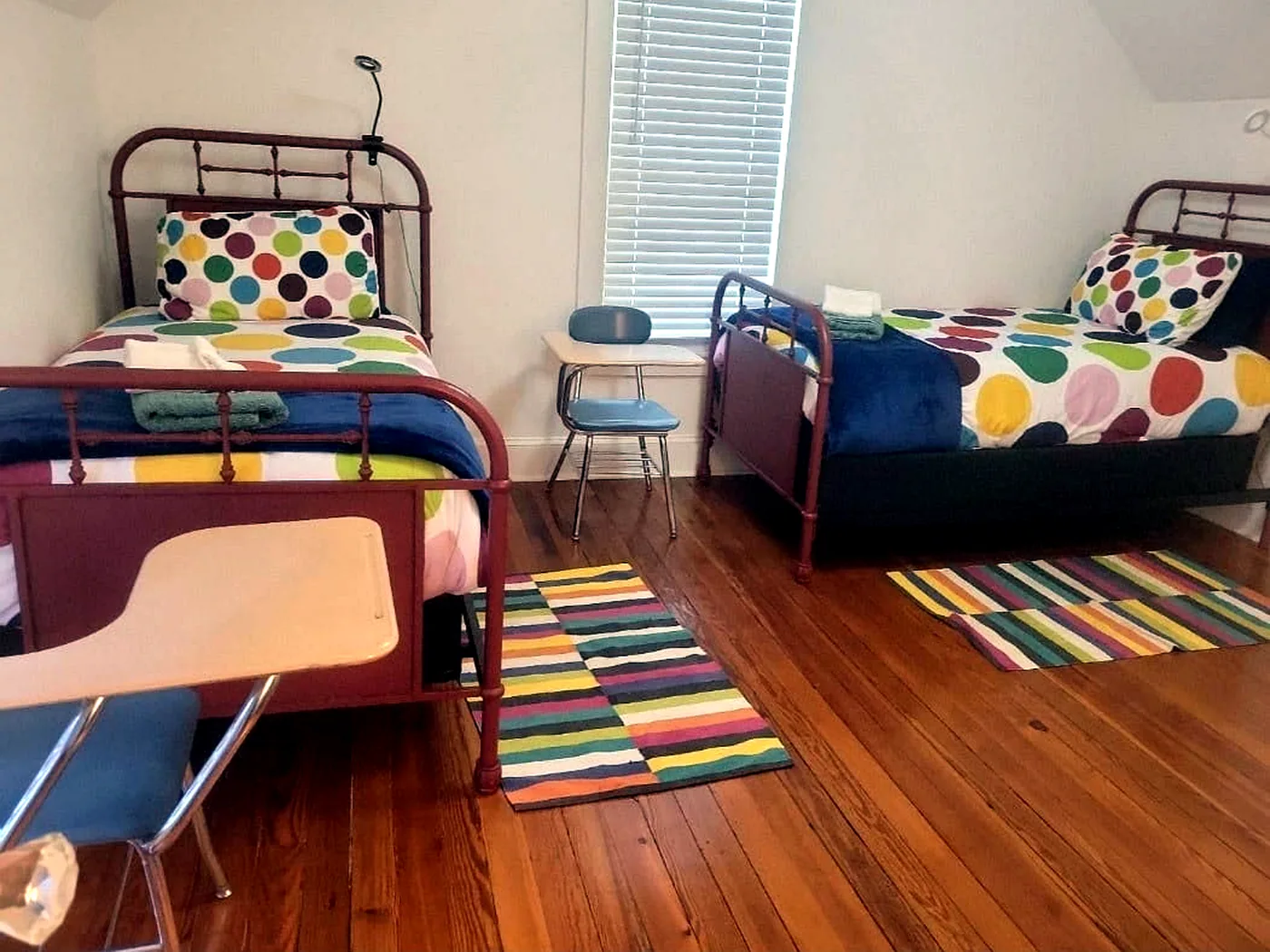 Twin bedroom after cleaning and organizing