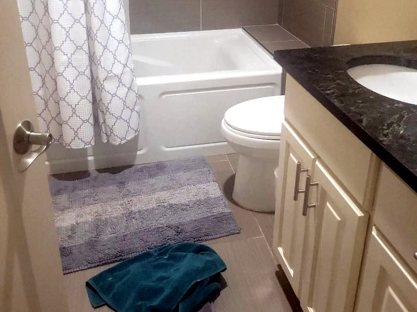 Gray bathroom before cleaning